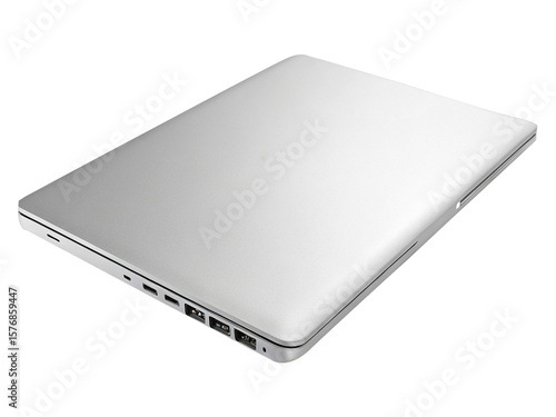 A closed silver laptop with visible ports on a black background in a studio setting close up view