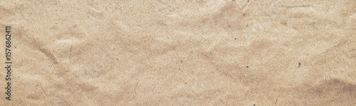 Kraft paper texture. Brown cardboard background 