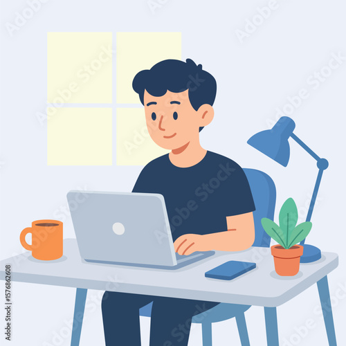 Young Man Working on Laptop in Home Office