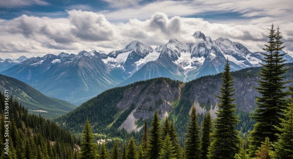 Fototapeta premium Majestic Snow Capped Mountains Rise Above Lush Green Valleys Under a Dramatic Cloudy Sky