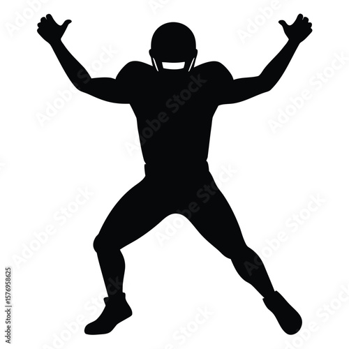 Black silhouette of an american football player celebrating a successful play or touchdown victory