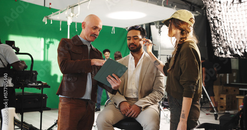 Obraz na plátně People, actor and director with clipboard in studio for scene notes, feedback and filming advice