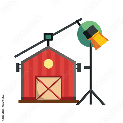 Filming a red barn with a movie light and crane
