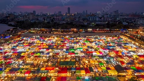 Time lapse video from dusk to night view of the Train Night Market Ratchada, Bangkok, Thailand
