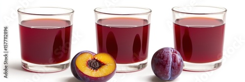 Plum juice in glasses fresh plum halves healthy drink antioxidant beverage fruit juice refreshment delicious drink
