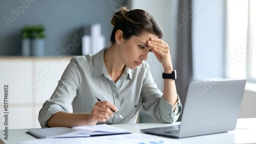 Woman stressed at desk