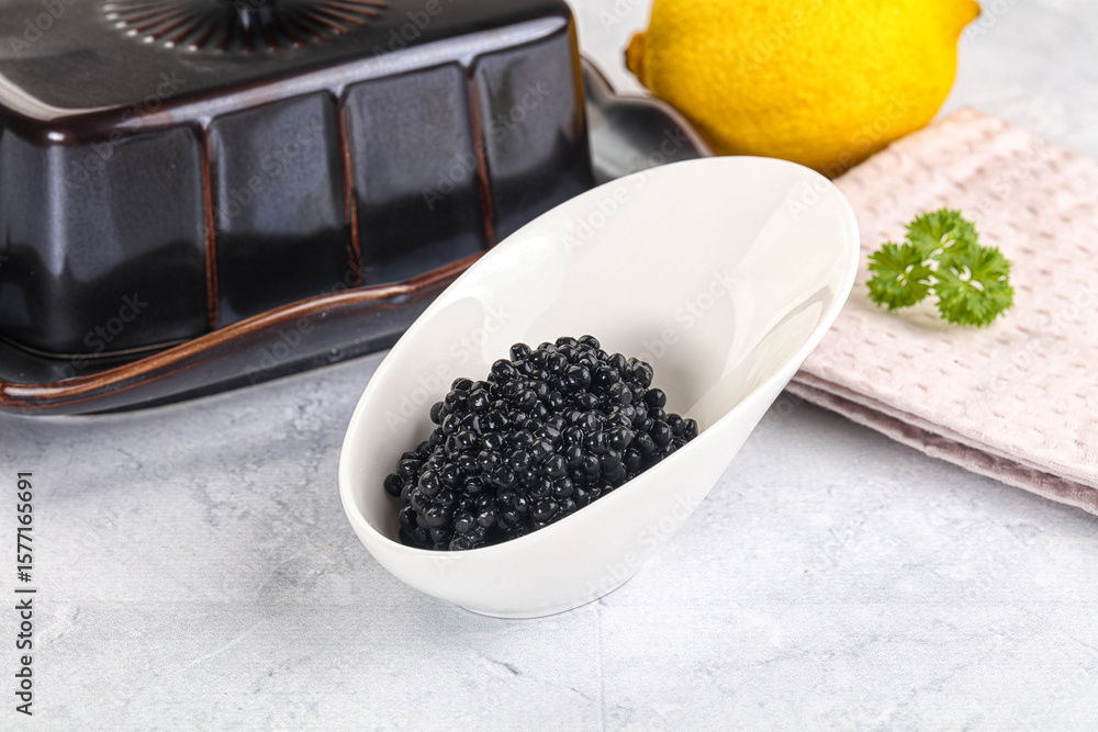 black sturgeon caviar in the bowl black sturgeon caviar in the bowl