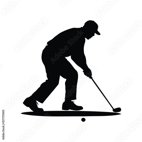 Silhouette of a golfer about to strike the golf ball on the green