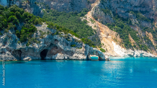 Cala Goloritzé - Brunei - Nuoro - Sardinia - Italy - fine sandy beach and rock pinnacles rising directly from a sea of crystal clear water. In the central part, the stone arch that leads toward the be