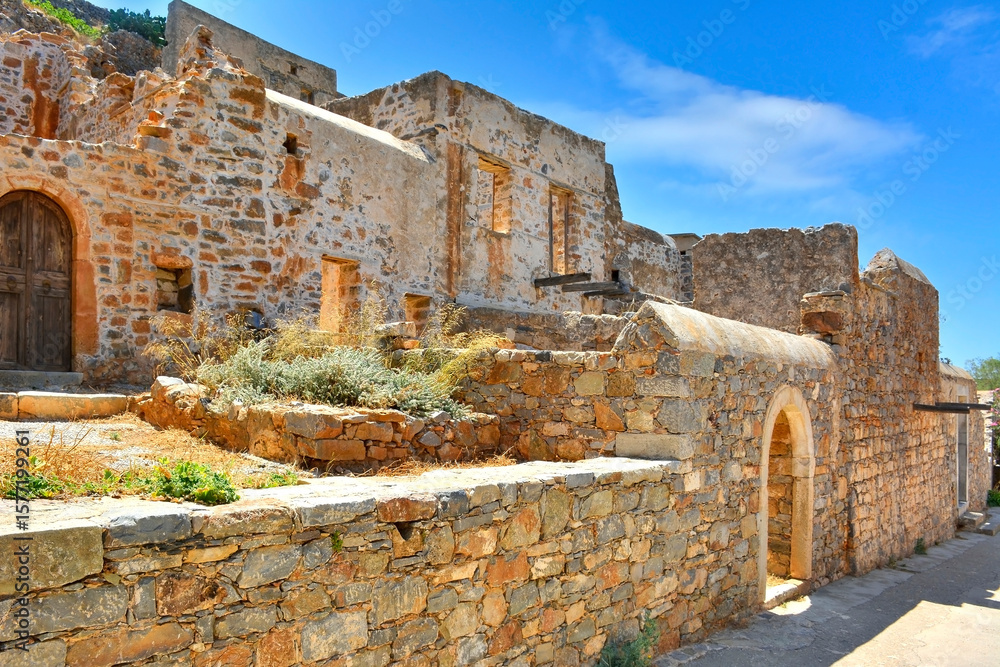 Fototapeta premium The abandoned old buildings leper station on the island of Spinalonga. It was used as a leper colony from 1903 to 1957. Now a popular tourist destination. 