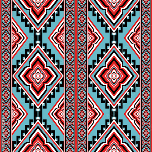 Geometric textile pattern with diamond shapes tribal motifs and repeating elements on a blue background