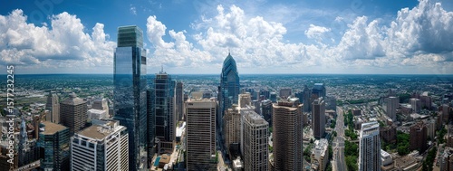 Cityscape panorama of Philadelphia under a partly cloudy sky