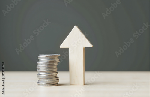 Coins and Upward Arrow