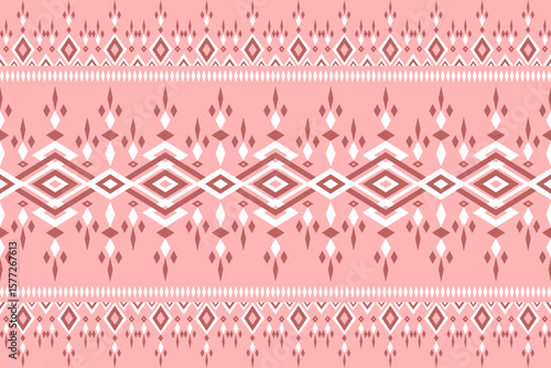 Seamless ornate geometric pattern with repeating diamond and triangle shapes on soft pink Traditional textile motif