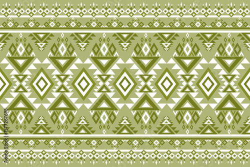 Abstract seamless background displaying a tribal geometric pattern in harmonious olive green and white tones