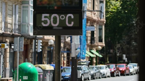 Street thermometer in Bilbao showing extreme 50 degrees Celsius heat in summer