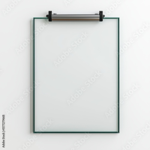 Minimalistic Glass Frame with Clip Hanging on White Wall
