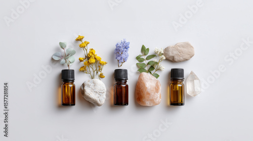 Natural wellness flat lay with essential oils crystals and dried flowers for aromatherapy