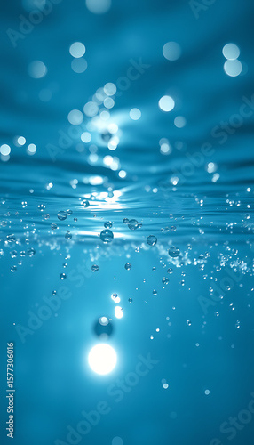 Glimmering turquoise waters sparkle with suspended droplets and bubbles, creating a refreshing and tranquil abstract underwater atmosphere.