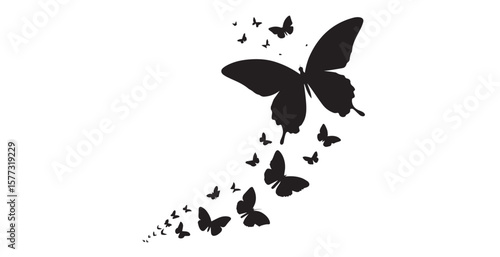 A swarm of black butterflies in silhouette flying in formation