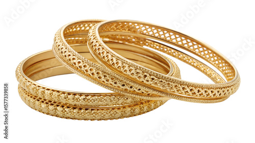 A stack of intricately designed gold bangles, isolated on a transparent background