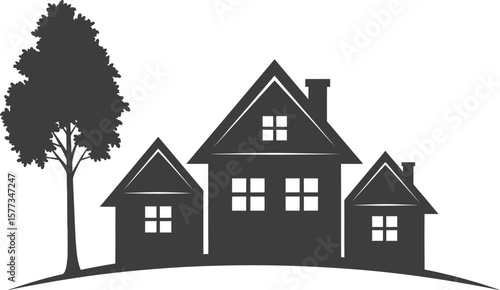 Three houses and a tree silhouette on a small hill in black and white