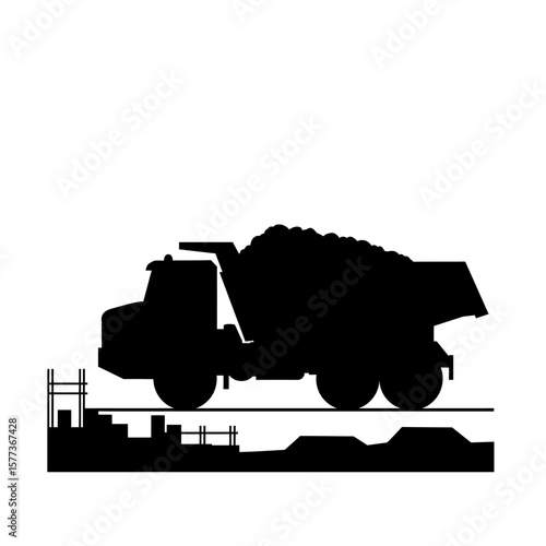 Silhouette of a heavy-duty dump truck filled with materials, driving on a construction site with scaffolding.