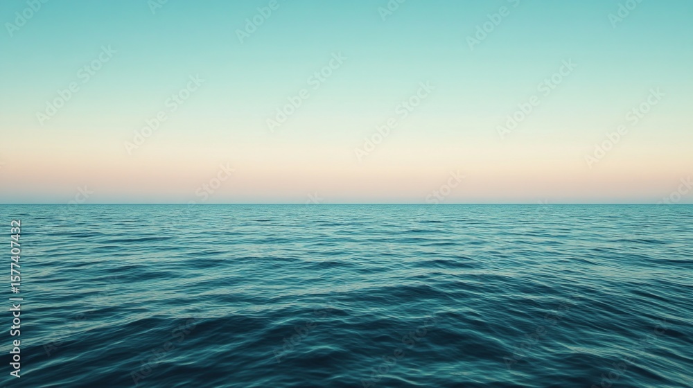 Fototapeta premium Serene Ocean Horizon at Sunset Over Calm Water Surface