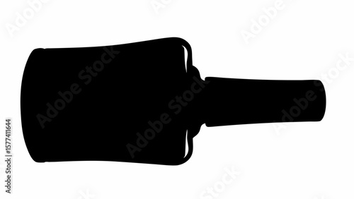 Silhouette of a cylindrical object with a handle extending from it, set against a white background space