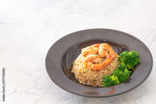 Closed up homemade fired rice with shrimps and broccoli on white background, favorite menu in restaurant