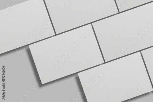 Blank business card mockup on a grey background. 85x55 mm. 
