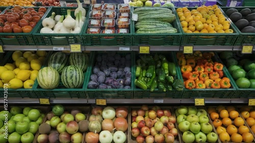 Fresh fruits and vegetables on supermarket shelves [4K]