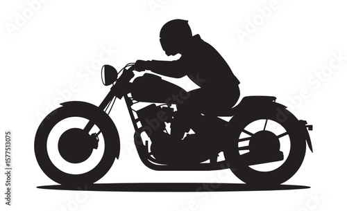 Silhouette of a person riding a motorcycle with a helmet