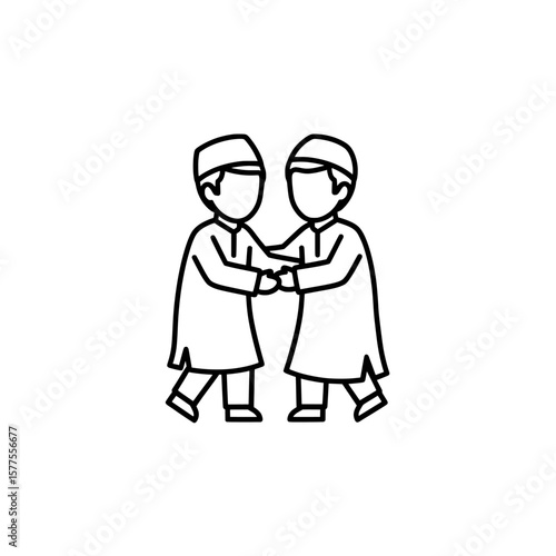 Two children shaking hands while wearing traditional robes and caps
