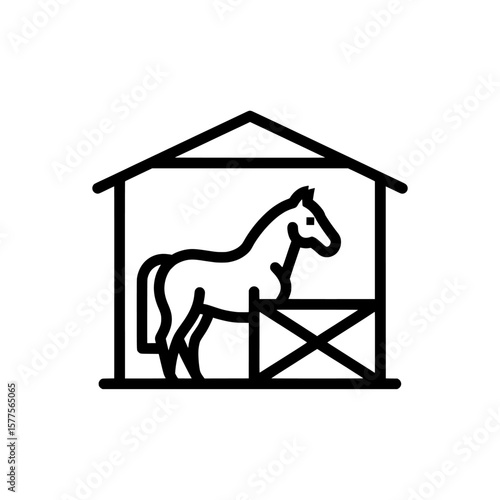 Horse in stable with hay and fence for farm animal keeping