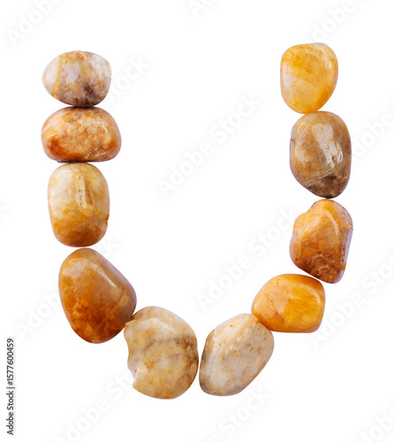 Wallpaper Mural letter U is made of stone with a white background. The creative shapes of the letters of the alphabet are arranged with stones Torontodigital.ca