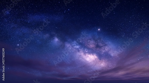 a breathtaking view of a starry night sky, Milky Way visible, glowing stars, serene atmosphere, deep blue and purple tones
