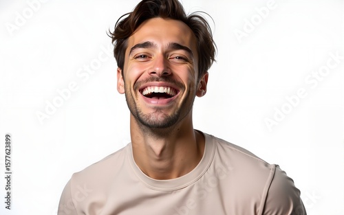 A professional portrait studio photo of a handsome young white american man model with perfect clean teeth laughing and smiling. isolated on white background. High quality