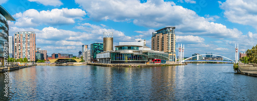 A panorama view down the Manchester ship canal towards Salford Quays,  Manchester,UK in summertime