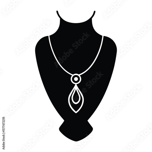 Black and white pearl necklace on a mannequin for luxury fashion display.