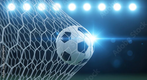 Wallpaper Mural Soccer ball hitting the back of the net under bright stadium lights. Dramatic goal-scoring moment in a football match at night. Torontodigital.ca