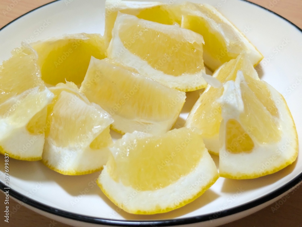 Cut fresh white grapefruit on a plate Cut fresh white grapefruit on a plate