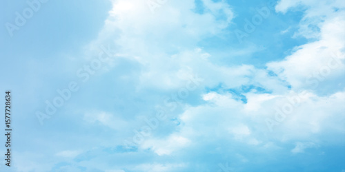 Blue sky, sun, clouds. A peaceful moment with underlying complexity. A reflection of the sky on thin clouds. Hidden emotions beneath a bright exterior like feeling melancholic on a good day background