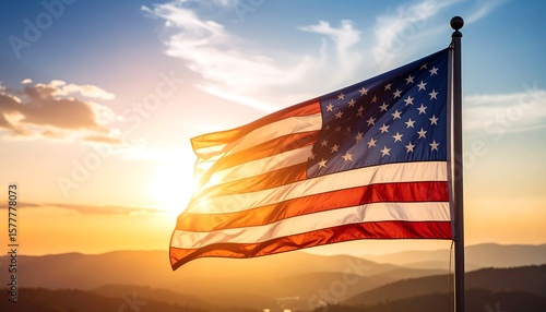 American flag waving in sunset over mountains