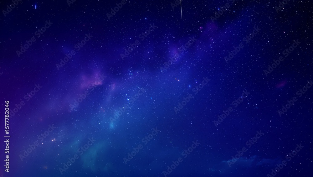 Fototapeta premium Vast deep blue night sky filled with twinkling stars and colorful nebulae