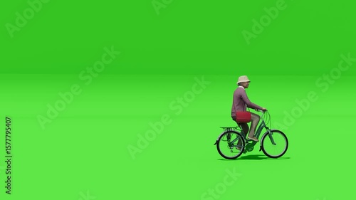 A mature woman riding a bike in side profile on chroma green screen Perfect for animation or VFX