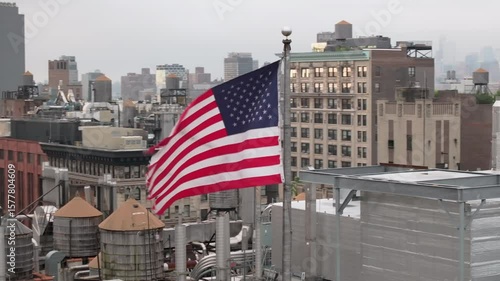 Aerial view of the American flag flying above New York City