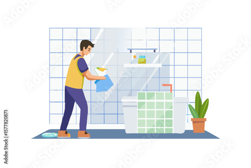 Man cleaning bathroom shower glass with spray bottle and cloth