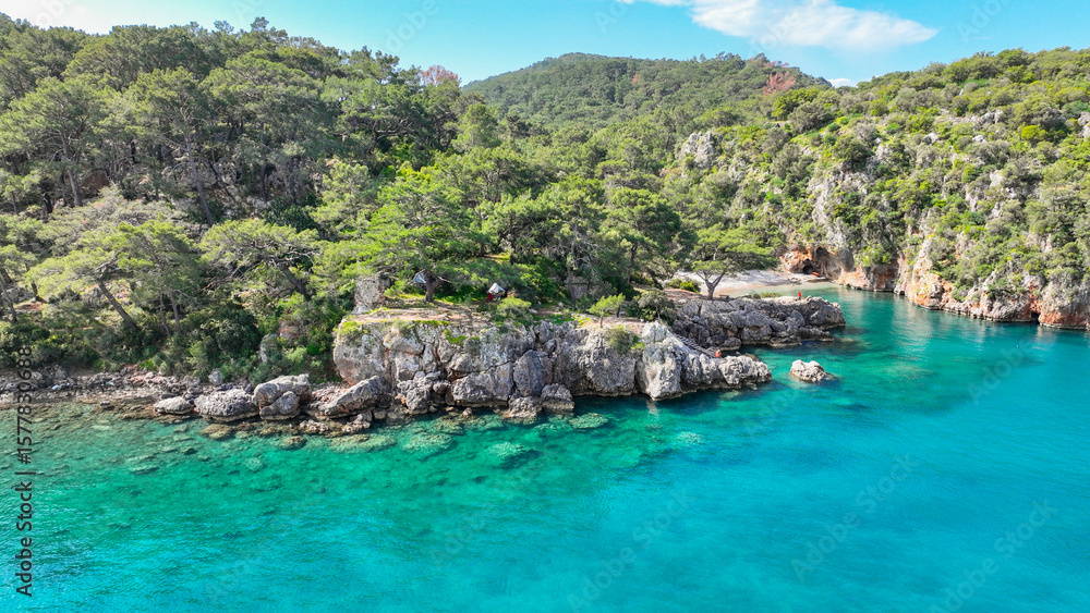 Obraz premium defaultKorsan Cove. Located in the Kumluca district, Korsan Cove ( K is a small and clean bay containing the ruins of the Ancient City of Melanippe, to the west of Gelidonya Feneri. Korsan Koyu Karaoz