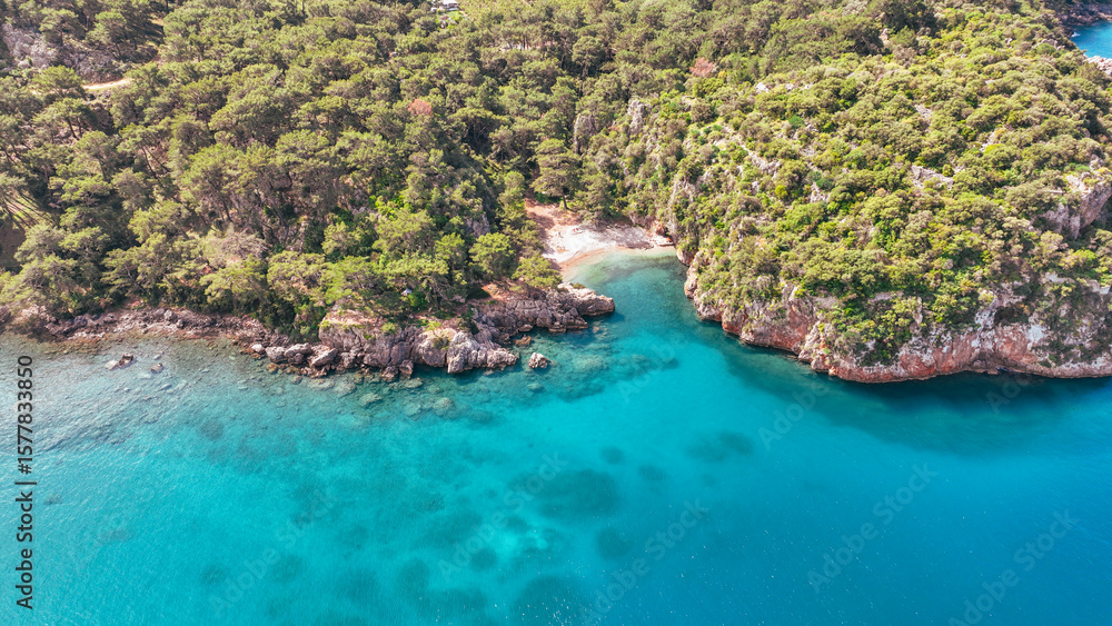 Obraz premium defaultKorsan Cove. Located in the Kumluca district, Korsan Cove ( K is a small and clean bay containing the ruins of the Ancient City of Melanippe, to the west of Gelidonya Feneri. Korsan Koyu Karaoz